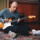 pierre-teppaz Singer, songwriter, and guitarist Pierre Teppaz playing his guitar.